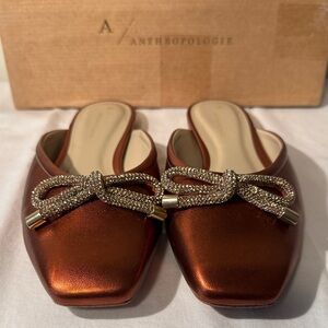Anthropologie Metallic Copper Leather Mules with Bow Accent